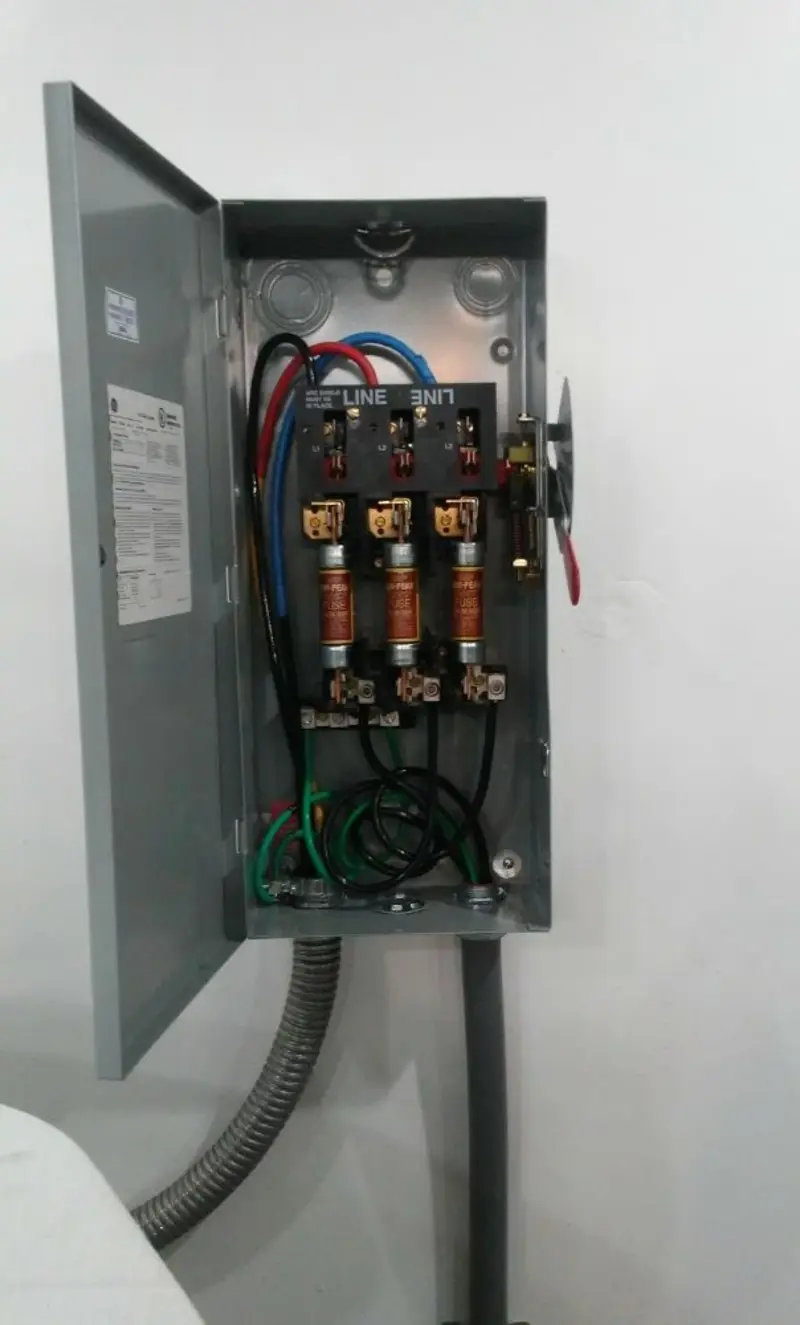 Three-phase disconnect switch installed for Smoke Detector Installation in Haines City